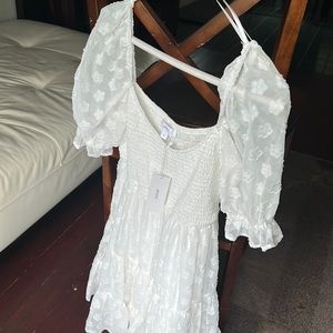 White dress with with flower details